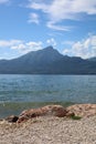 View of the lake and the mountain formation from the east side to the west side of the lake in beautiful weather with blue sky Royalty Free Stock Photo