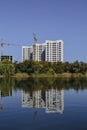 view from the lake to the construction site Royalty Free Stock Photo