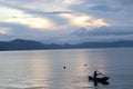 The view of Lake Toba in North Sumatera Indonesia where a local sailorman is fishing.traditionally