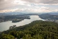 View from Lake WÃÂ¶rther See in the Austrian Alps overlooking a beginning storm with dark clouds and rain