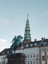 View of the landmark green spire of the former St. Nicholas Church, now Nikolaj Contemporary Art