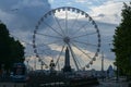 The view landmark before a summer sunset - touristic wheel with amazing view over the city