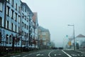 View landscape cityscape and classic retro vintage building old town with traffic road with mist in morning time at Strasbourg