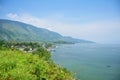 View landscape Danau Toba Lake and Tao Batak Toba Caldera Supervolcano at tomok village hill and Sipiso Piso mountains in Royalty Free Stock Photo