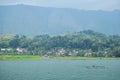 View landscape Danau Toba Lake and Tao Batak Toba Caldera Supervolcano at tomok village hill and Sipiso Piso mountains in Royalty Free Stock Photo