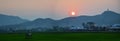 View landscape farmland and paddy rice field in farm meadow of cityscape countryside rural and mountain hill for thai people Royalty Free Stock Photo