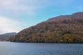 View of Landscape mountain and forest chang color leaf at Lake Ashi in Autumn season Japan Royalty Free Stock Photo