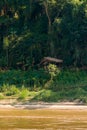 View of the landscape of the river Nam Khan, Luang Prabang, Laos. Copy space for text. Vertical. Royalty Free Stock Photo