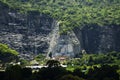 View landscape and sculpture carving big buddha carving on stone cliff mountain Wat Khao Tham Thiam for thai people travelers