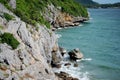 View landscape seascape and cliff of Ko Sichang island mountain with wave sea ocean beach for thai people and foreign travelers Royalty Free Stock Photo