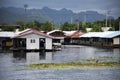 View landscape Si Sawat river and life of thai people with antique home and resort guest house on rafting floating in Khwae Yai