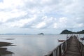 View landscape wooden bridge and boat pier go to Koh Pitak or Ko Phithak Island in Gulf of Thailand for eco tourism for thai Royalty Free Stock Photo