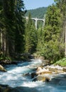 View of the Langwies Viaduct in the mountains of Switzerland near Arosa and a river below Royalty Free Stock Photo