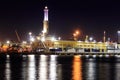 View of Lanterna (lighthouse) in the old port of the city of Genoa at night, Italy Royalty Free Stock Photo