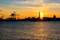 View of Lanterna (lighthouse) in the old port of city of Genoa at sunset, Italy