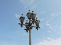 View of streetlamps on embankment and blue sky in summer Tallinn