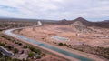 View of a large canal flowing through Vistancia, Arizona