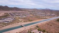 View of a large canal flowing through Vistancia, Arizona