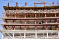 View of a large construction site with buildings under construction and multi-storey residential homes.Tower cranes in Royalty Free Stock Photo