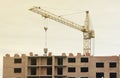 View of a large construction site with buildings under construction and multi-storey residential homes. Tower cranes in Royalty Free Stock Photo