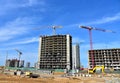 View on the large construction site . Facde of the modern multi-storey residential building. Royalty Free Stock Photo