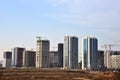 View of a large construction site. Tower cranes in action. Housing renovation concept. Crane during formworks. Construction the Royalty Free Stock Photo