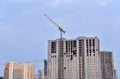 View of a large construction site. Tower cranes in action. Housing renovation concept. Crane during formworks. Construction the Royalty Free Stock Photo