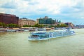View of large cruise touristic boat with hotel and restaurant on board on Danube river, Budapest Royalty Free Stock Photo