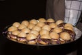 View of a large platter of mini burgers called sliders