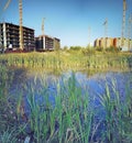 View of a large-scale construction of residential buildings with construction cranes Royalty Free Stock Photo