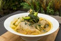 View of a large serving of Chicken Tinola, a Filipino soup dish served as an appetizer or a main entrÃÂ©e with white rice