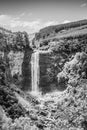 View Of a large waterfall and river, surrounded by lush green vegetation and mountains, Pietermaritzburg , Africa Royalty Free Stock Photo