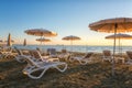 View of the Larnaca sandy beach at sunrise, tourist resort, Cyprus. Scenic seascape, travel background, summer holidays concept