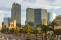 View of Las Vegas Boulevard, palm trees along the road, glass skyscraper, Las Vegas, USA