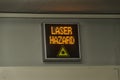 Laser danger sign in a lab Royalty Free Stock Photo