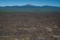 View of the lava flow from Phil Brogan viewpoint in Lava Lands Newberry Volcano National Monument. Mt. Bachelor in background