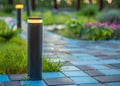 View of led lighting solar lamp in daytime in a green garden. Royalty Free Stock Photo
