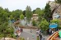 View from Les Espions de Cesar over water fountains and Le Grand Splatch attraction at Park Asterix, Ile de France, France