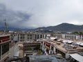 View of Lhasa town and surrounding mountains with the Potala Palace in the background, Tibet - Aug 2014 Royalty Free Stock Photo