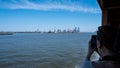 View of Liberty Island and Manhattan from a ferry of the Staten Island Ferry service Royalty Free Stock Photo