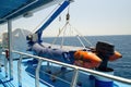 View of a lifeboat on the deck of a cruise ship. Royalty Free Stock Photo