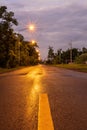 A view of the light from the long-exposure orange street lamps creating a beautiful starlight Royalty Free Stock Photo