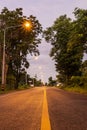 A view of the light from the long-exposure orange street lamps creating a beautiful starlight Royalty Free Stock Photo