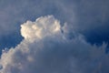 LIGHT FALLING ON THE TOP OF THE A LARGE WHITE CLOUD Royalty Free Stock Photo