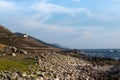 View of the lighthouse of cabo silleiro and the rocky coast. Galicia - Spain