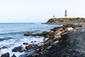 View of the lighthouse and chapel on the Peninsula Bolshoy Utrish, Russia on the Black sea in summer.