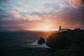 View of the lighthouse and cliffs at Cape St. Vincent in Portugal at sunset. Royalty Free Stock Photo