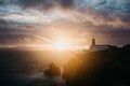 View of the lighthouse and cliffs at Cape St. Vincent in Portugal at sunset. Royalty Free Stock Photo