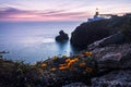 View of the lighthouse and cliffs at Cape St. Vincent at sunset. Continental Europe most South-western point Royalty Free Stock Photo