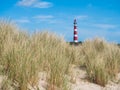 View on lighthouse in the dunes of Ameland, Holland Royalty Free Stock Photo